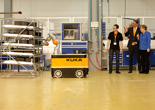 German Chancellor Angela Merkel visited KUKA in Augsburg to discuss the factory of the future 