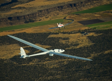 The Perlan 2 glider performs its maiden flight soaring 5,000 feet above Roberts Field in Redmond, Oregon.