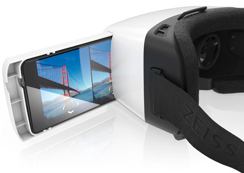 Simply place a smartphone into a tray and slide it into the ZEISS VR ONE the Virtual Reality headset.