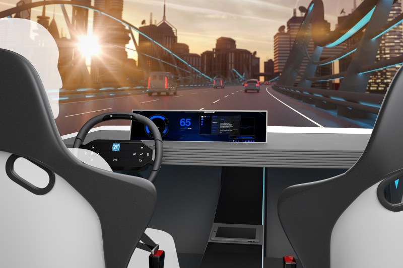 The ZF Concept Cockpit showcases four practical integrated innovations, including a special steering wheel with hands on/off detection, a touch display with realistic key simulation, a new, highly precise facial and emotion recognition feature, and actively responsive and communicating seat belts.