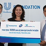 World Toilet Day 2012 CEO of World Toilet Organisation Mr. Jack Sim, Marketing Vice President of Unilever Vietnam Ms. Nguyen Thi Bich Va and Chief of Staff Vinh Long Peoples Commitee Mr. Nguyen Hoang Hoc hold a cheque at the Media Briefing for World Toilet Day 2012, Vinh Long Province, Vietnam.