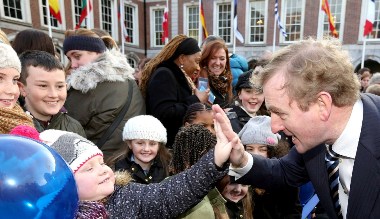 Taoiseach, Enda Kenny, Tanaiste greets young students from  the international school Dublin at the flag raising ceremony in Dublin Castle today (31st December 2012) to mark the start of Irelands European Presidency. Pic: Justin Mac Innes / Mac Innes Photography.