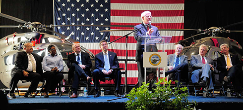 Pictured from left are Joe Max Higgins, CEO of Golden Triangle Development LINK, Gloria Ervin, Navy veteran and American Eurocopter human resources assistant, Marc Paganini, President and CEO American Eurocopter, Rep. Gregg Harper, Sen. Roger Wicker, speaking, Sean O’Keefe, Chairman and CEO EADS North America, Rep. Alan Nunnelee and Mississippi Governor Phil Bryant.