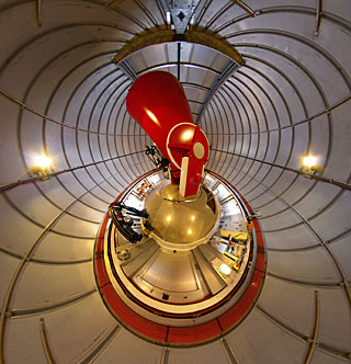 The Swiss 1.2-metre Leonhard Euler Telescope in its dome at La Silla --  This unusual and striking image is a fish-eye photograph of the inside of the dome of the Swiss 1.2-metre Leonhard Euler telescope at ESO’s La Silla Observatory in Chile. The view is highly distorted but the telescope itself is the red structure at the centre of the picture. Credit: ESO/M.Tewes