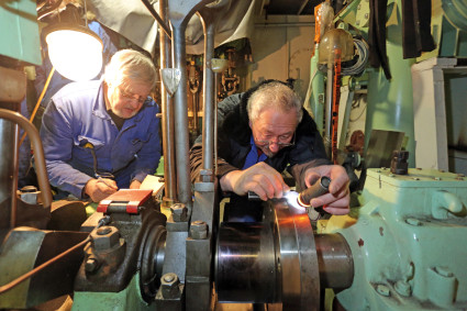 Club members check the axial and radial runout of the steam engines and their thrust bearings.