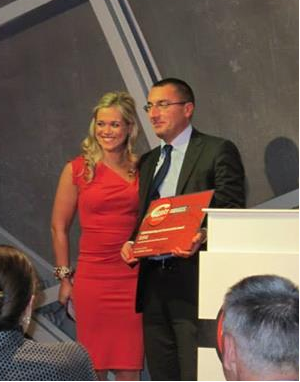 EURid's External Relations Manager Giovanni Seppia  accepting the Marketing and Communication award. Courtesy of Katrina Sataki.