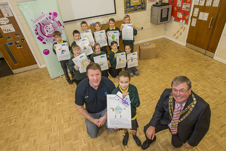 Dwr Cymru Welsh Water Stop the Block competition winners. Pupils from Ysgol Escob Morgan in St Asaph. Rhodri Sellers from Welsh Water and the Mayor of St Asaph, Cllr Peter Scott were at the school to present prizes to runners up and the winner Erin Jones, 9.