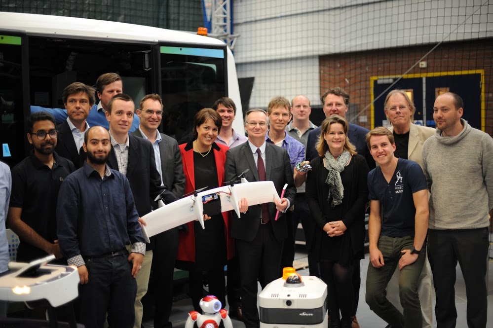 Pierre Nanterme, chairman and CEO of Accenture, visits with RoboValley robotics researchers in Delft, the Netherlands