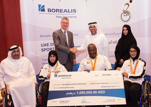 In the middle/standing; H.E. Mohamed M. Al Hameli UAE Disabled Sports Federation Chairman and Mark Garrett, Borealis Chief Executive at Borealis Social Fund even 